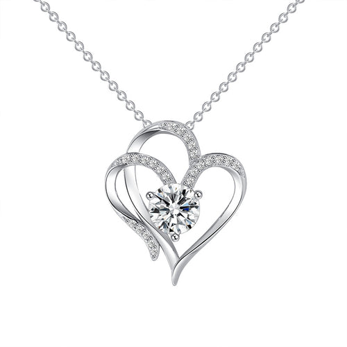 Silver double heart pendant with pave stones along one heart and a round solitaire at the centre, on a fine cable chain